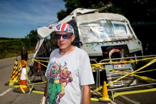 Gypsy Neil Wainwright beside his mobile home on the side of the road near Hayle Gypsy Neil Wainwright beside his mobile home on the side of the road near Hayle